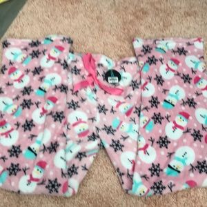 Pink pajama pants with snowman and snowflakes